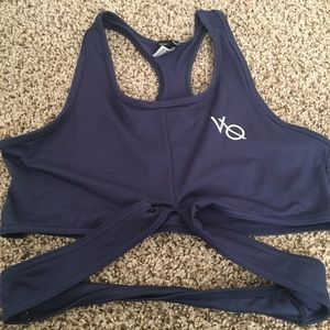 vanquish cross body top